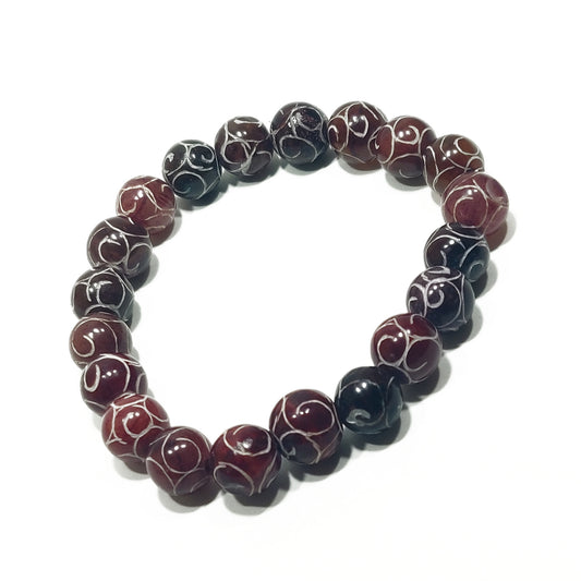 Carved red jade bracelet
