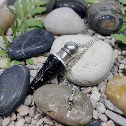 Tourmaline witness pendulum